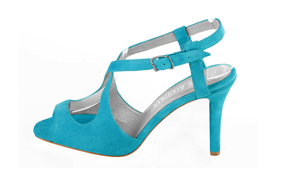 Women's turquoise blue elegant cross straps sandals. Round toe. High slim heel - Profile view